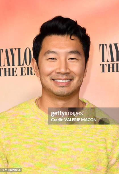 Canadian actor Simu Liu arrives for the "Taylor Swift: The Eras Tour" concert movie world premiere at AMC The Grove in Los Angeles, California on...