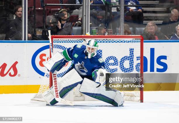 Casey DeSmith of the Vancouver Canucks makes a save during the third period of their NHL game against the Edmonton Oilers at Rogers Arena October 11,...