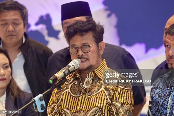 In this photo taken on October 5 former Agriculture Minister Syahrul Yasin Limpo delivers a statement to journalists in Jakarta, after the Corruption...