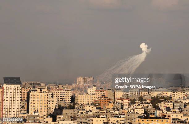 Phosphorus missile fired by Israeli aircraft over the sky of Gaza City. On Oct 7, the Palestinian militant group Hamas launched a surprise attack in...