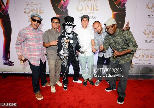 Members of the Jabbawockeez dance crew arrive at the world premiere of "Michael Jackson ONE by Cirque du Soleil" at THEhotel at Mandalay Bay on June...