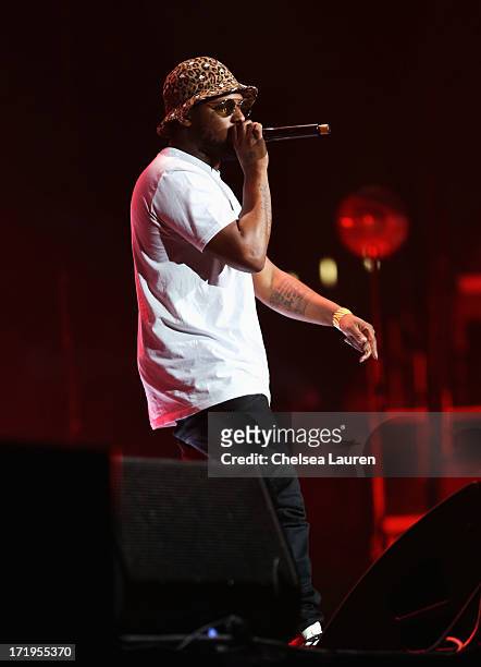 Hip hop artist Schoolboy Q performs during the Snoop Dogg, Kendrick Lamar, J.Cole, Miguel and SchoolBoyQ concert during the 2013 BET Experience at...