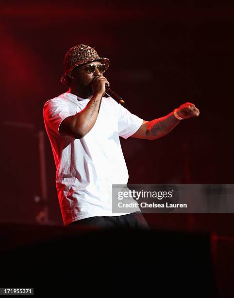 Hip hop artist Schoolboy Q performs during the Snoop Dogg, Kendrick Lamar, J.Cole, Miguel and SchoolBoyQ concert during the 2013 BET Experience at...