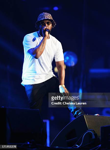 Hip hop artist Schoolboy Q performs during the Snoop Dogg, Kendrick Lamar, J.Cole, Miguel and SchoolBoyQ concert during the 2013 BET Experience at...