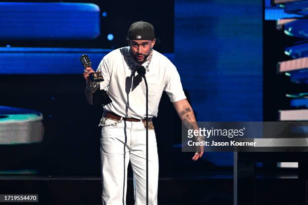 Bad Bunny accepts an award on stage during the 2023 Billboard Latin Music Awards at Watsco Center on October 05, 2023 in Coral Gables, Florida.