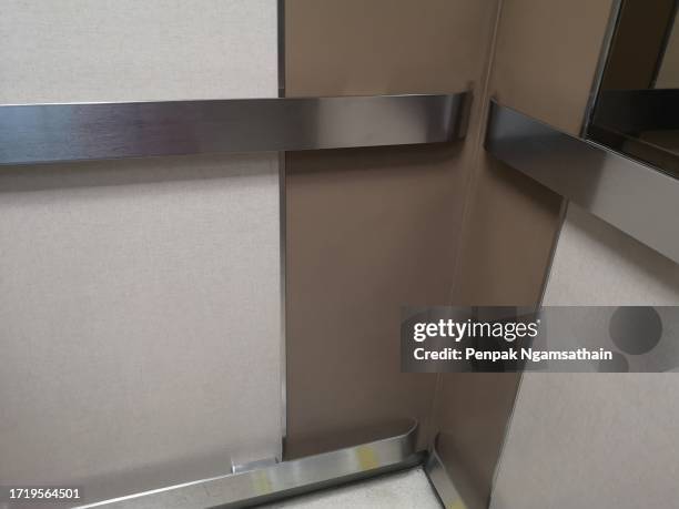 wall-mounted shockproof stainless steel in the elevator - social distancing elevator stock pictures, royalty-free photos & images