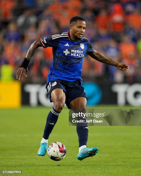 Alvas Powell of FC Cincinnati controls the ball during the second half of an MLS soccer match against the New York Red Bulls at TQL Stadium on...