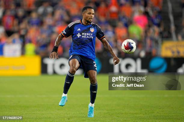 Alvas Powell of FC Cincinnati controls the ball during the second half of an MLS soccer match against the New York Red Bulls at TQL Stadium on...