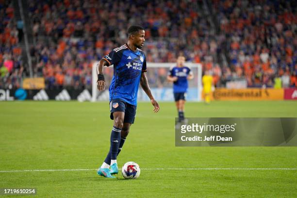 Alvas Powell of FC Cincinnati controls the ball against the New York Red Bulls during the second half of an MLS soccer match against the New York Red...