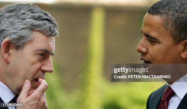 Britain's Prime Minister Gordon Brown talks to US Democratic presidential candidate Barack Obama in the garden of Number 10 Downing Street in London...