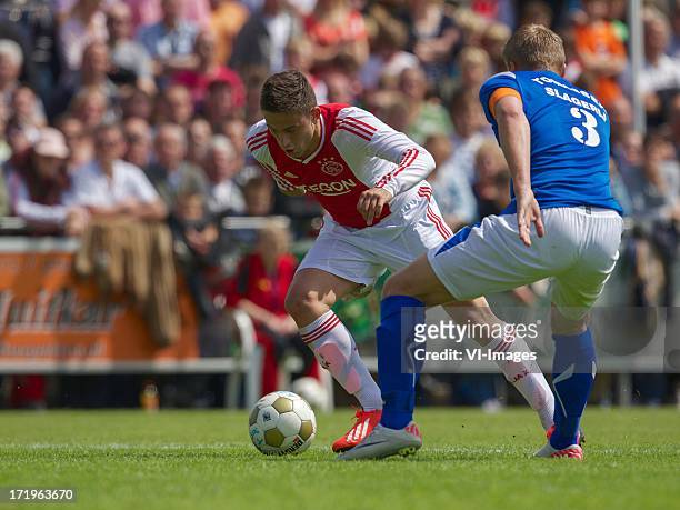 Dejan Meleg of Ajax, Richard Gooijer of SDC Putten during the pre season friendly match between SDC Putten and Ajax on June 29, 2013 in Putten, The...