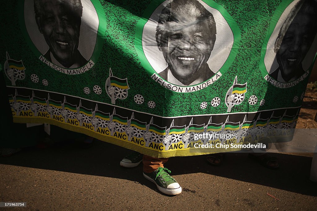 Focus Continues To Surround The Hospital Where Nelson Mandela's Condition Is Said To Be Critical