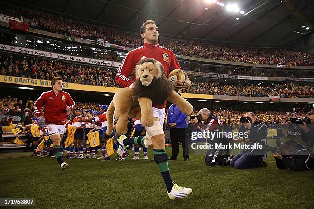 Lions captain Sam Warburton runs out onto the field before game two of the International Test Series between the Australian Wallabies and the British...