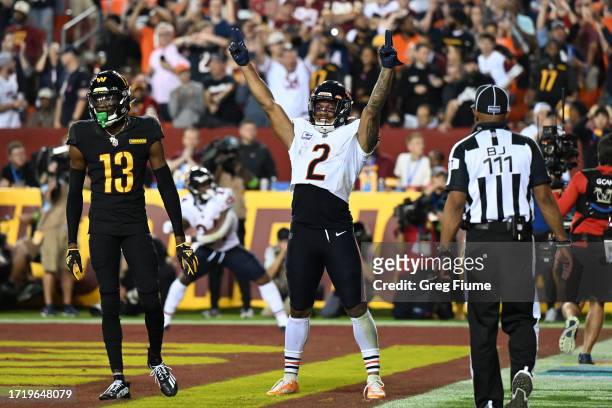 Moore of the Chicago Bears celebrates after a touchdown by Cole Kmet during the second quarter against the Washington Commanders at FedExField on...