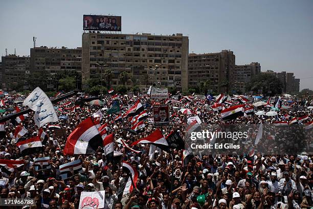 Supporters of Egyptian President Mohammed Morsi chant during a demonstration at the Rabaa al-Adaweya Mosque in the suburb of Nasr City on June 30,...