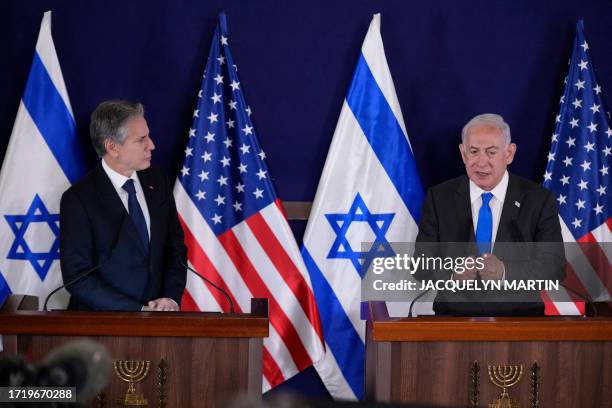 Secretary of State Antony Blinken and Israel's Prime Minister Benjamin Netanyahu give statements to the media inside The Kirya, which houses the...