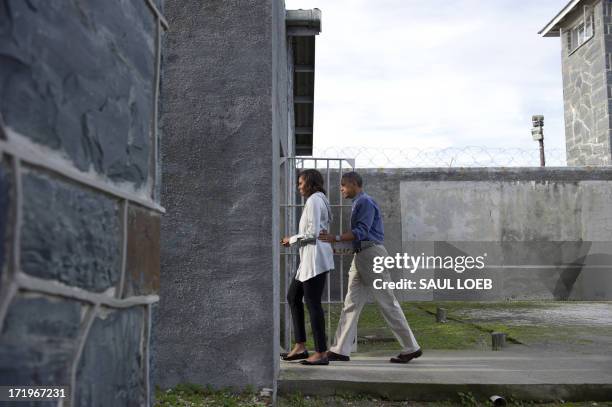 President Barack Obama and First Lady Michelle Obama tour Robben Island where where South-African anti-apartheid activist Nelson Mandela, was once...