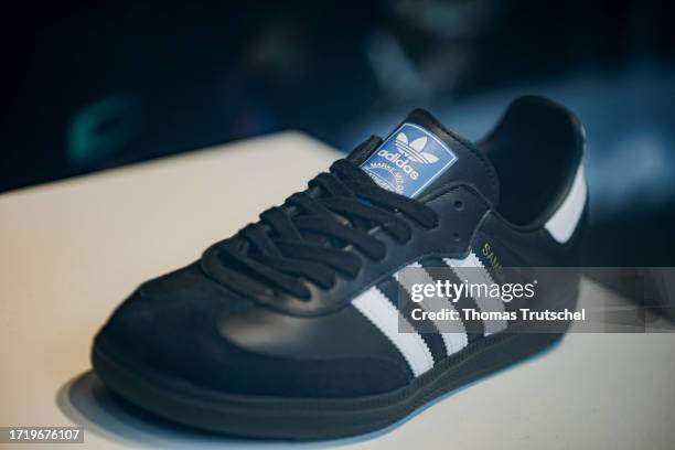 The Logo of fashion label Adidas is seen on a Samba Sneakers Shoe on October 12, 2023 in Berlin, Germany.