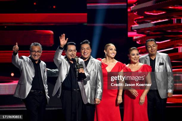 Los Angeles Azules speak onstage during the 2023 Billboard Latin Music Awards at Watsco Center on October 05, 2023 in Coral Gables, Florida.