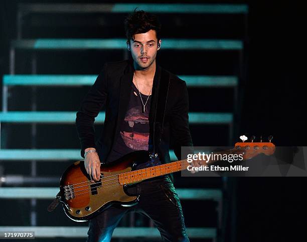 Bassist Ian Keaggy of Hot Chelle Rae performs as the band opens for Justin Bieber at the MGM Grand Garden Arena on June 28, 2013 in Las Vegas, Nevada.