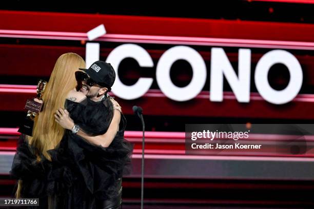 Ivy Queen and Yandel speak onstage during the 2023 Billboard Latin Music Awards at Watsco Center on October 05, 2023 in Coral Gables, Florida.