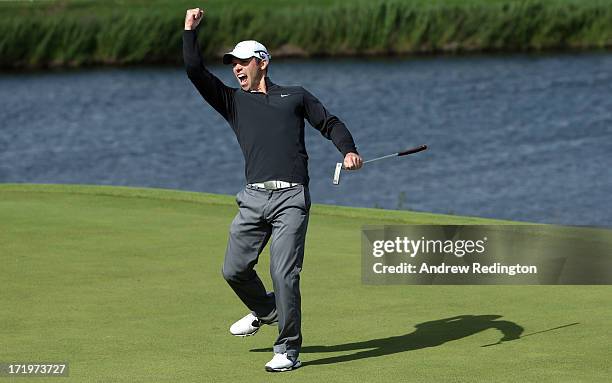 Paul Casey of England celebrates his eagle putt on the 18th green during the final round of the Irish Open at Carton House Golf Club on June 30, 2013...