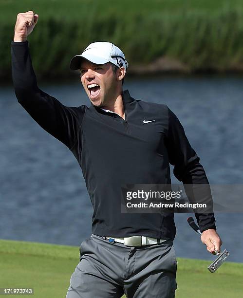 Paul Casey of England celebrates his eagle putt on the 18th green during the final round of the Irish Open at Carton House Golf Club on June 30, 2013...