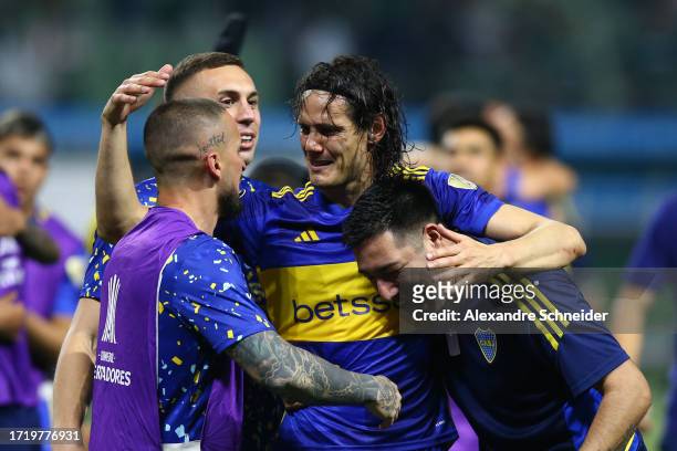 Edinson Cavani of Boca Juniors celebrates with teammates after winning in the penalty shoot out and advancing to the tournament's final following the...