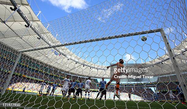 The ball hits the post prior to the opening goal during the FIFA Confederations Cup Brazil 2013 3rd Place match between Uruguay and Italy at Estadio...