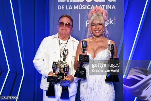 Guillermo Giraldo and Karol G attend the 2023 Billboard Latin Music Awards at Watsco Center on October 05, 2023 in Coral Gables, Florida.