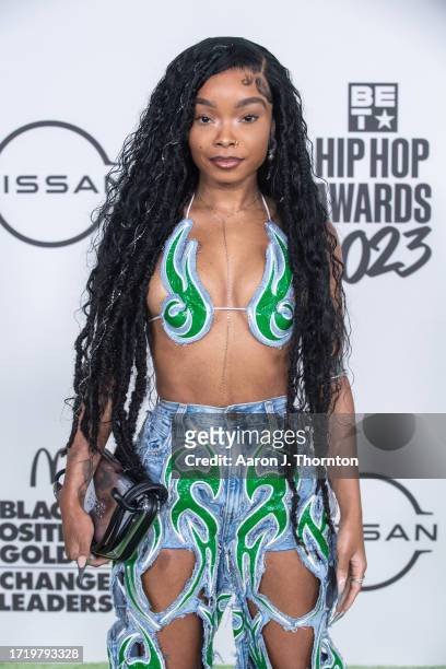 Lola Brooke arrives to the BET Hip Hop Awards at Cobb Energy Performing Arts Center on October 03, 2023 in Atlanta, Georgia.