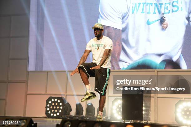 LeBron James of the Miami Heat attends the NBA Championship victory rally at the AmericanAirlines Arena on June 24, 2013 in Miami, Florida. The Miami...