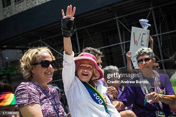Edie Windsor, who successfully sued the United States government over the constitutionality of the Defense of Marriage Act , waves to revelers while...