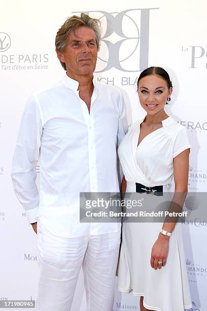 Barriere Group Dominique Desseigne and Alexandra Cardinale attend 'Brunch Blanc' hosted by Groupe Barriere for Sodexho on June 30, 2013 in Paris,...