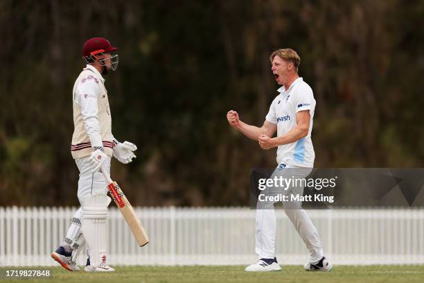 Jack Edwards of New South Wales celebrates taking the wicket of Matt Renshaw of Queensland during the Sheffield Shield match between New South Wales...