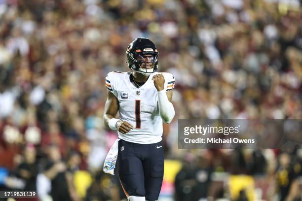 Justin Fields of the Chicago Bears reacts during an NFL football game between the Washington Commanders and the Chicago Bears at FedExField on...