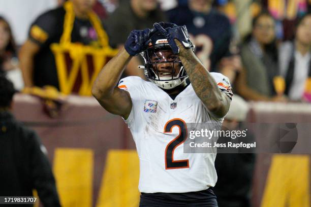 Moore of the Chicago Bears celebrates after scoring a touchdown during the fourth quarter against the Washington Commanders at FedExField on October...