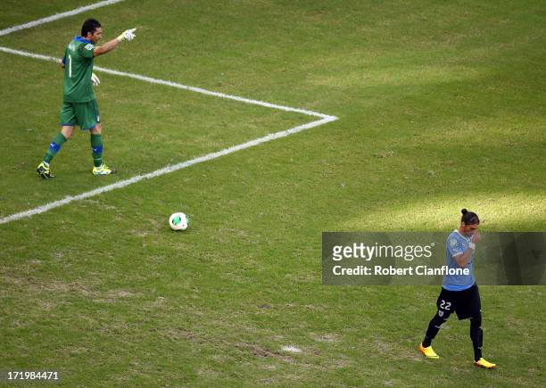 Gianluigi Buffon of Italy reacts after saving the penalty of Martin Caceres of Uruguay during a shootout during the FIFA Confederations Cup Brazil...