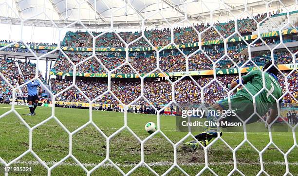 Gianluigi Buffon of Italy saves the penalty of Walter Gargano of Uruguay to clinch victory in a shootout during the FIFA Confederations Cup Brazil...