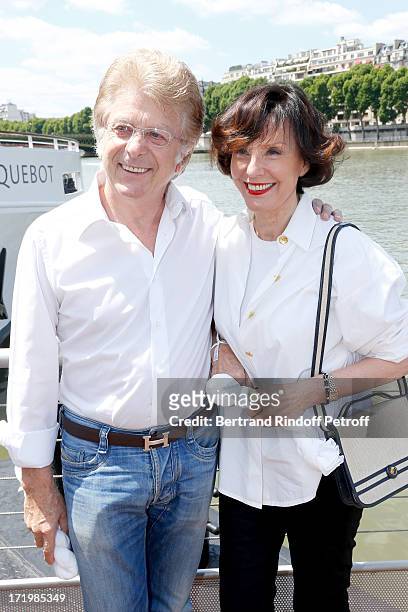 Denise Fabre and her husband Francis Vandenhende attend 'Brunch Blanc' hosted by Groupe Barriere for Sodexho with a cruise in Paris on June 30 France.