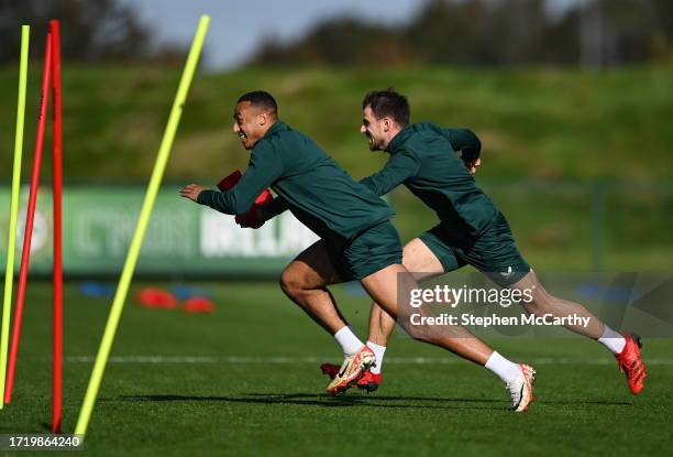 Dublin , Ireland - 12 October 2023; Adam Idah and Jayson Molumby, right, during a Republic of Ireland training session at the FAI National Training...