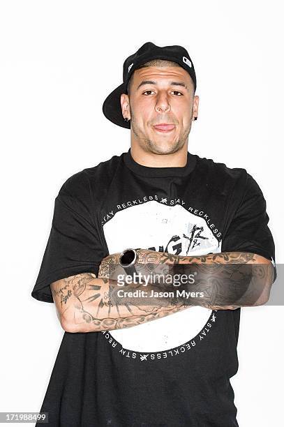 American Football Player and murder suspect Aaron Hernandez poses for a photo on March 10, 2012 in Palm Beach Gardens, Florida, USA.