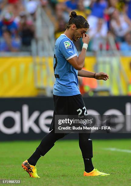 Martin Caceres of Uruguay reacts to missing a penalty during a shootout during the FIFA Confederations Cup Brazil 2013 3rd Place match between...