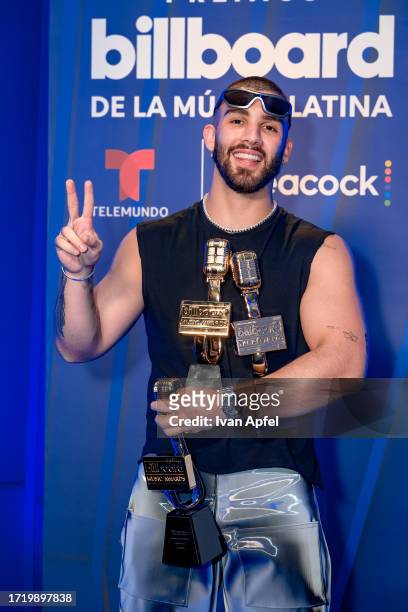 Manuel Turizo poses with his Tropical Song of the Year, Latin Airplay Song of the Year, and Global 200 Latin Song of the Year awards at the...