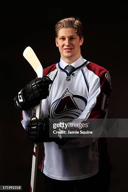 Nathan Mackinnon poses for a portrait after being selected number one over all in the first round by the Colorado Avalanche during the 2013 NHL Draft...