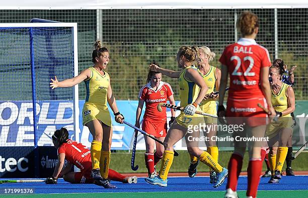 Kellie White of Australia celebrates after scoring the teams second goal of the game during the Investec Hockey World League - Final match between...