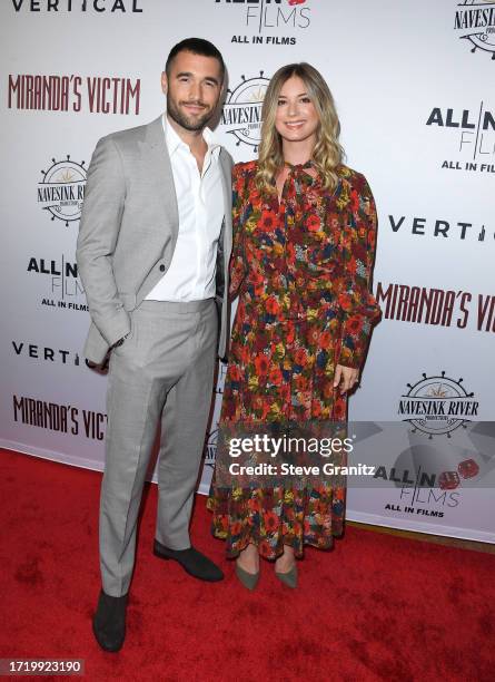 Emily VanCamp, Josh Bowman arrives at the Los Angeles Special Screening Of "Miranda's Victim" at Regency Bruin Theatre on October 05, 2023 in Los...