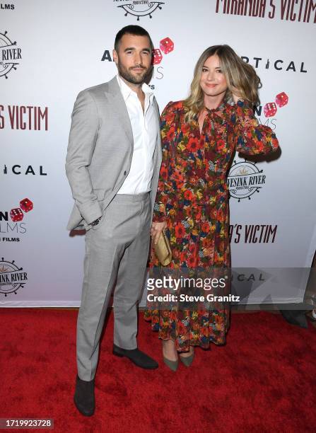 Emily VanCamp, Josh Bowman arrives at the Los Angeles Special Screening Of "Miranda's Victim" at Regency Bruin Theatre on October 05, 2023 in Los...