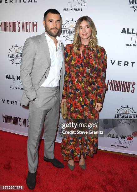 Emily VanCamp, Josh Bowman arrives at the Los Angeles Special Screening Of "Miranda's Victim" at Regency Bruin Theatre on October 05, 2023 in Los...