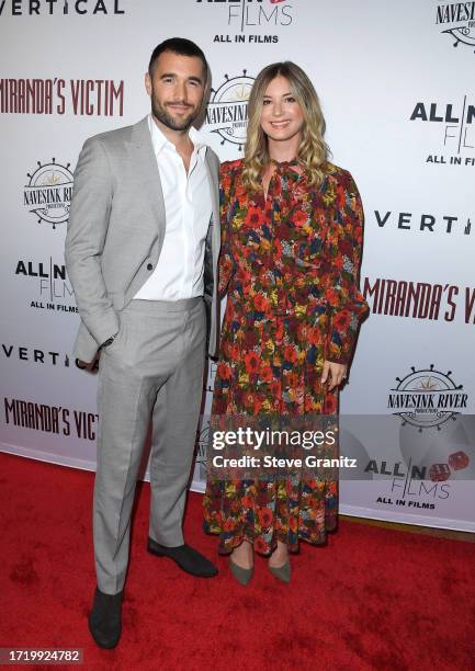 Emily VanCamp, Josh Bowman arrives at the Los Angeles Special Screening Of "Miranda's Victim" at Regency Bruin Theatre on October 05, 2023 in Los...